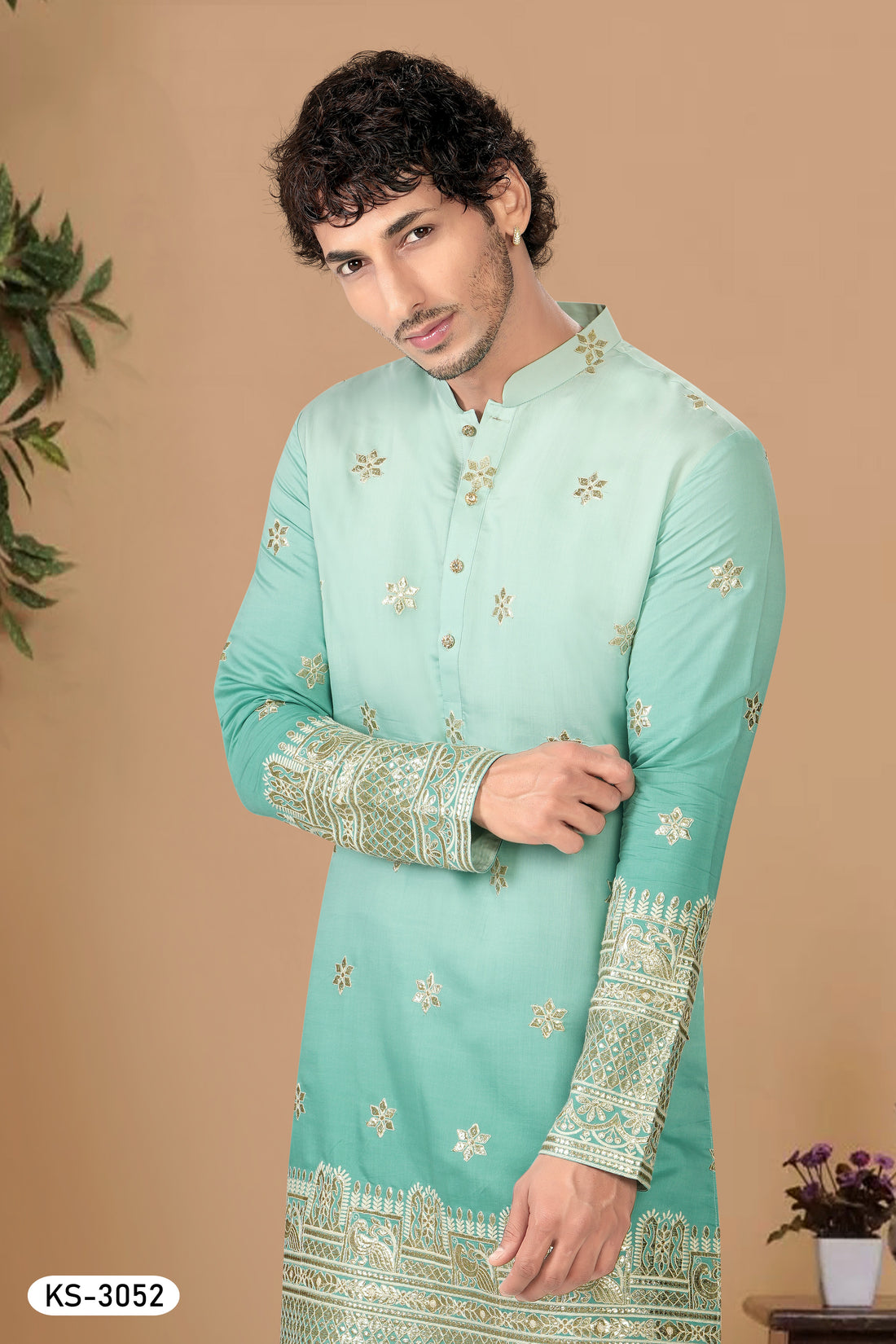 BLUISH-GREEN HUE KURTA SET WITH HEAVY THREAD EMBROIDERY PANEL