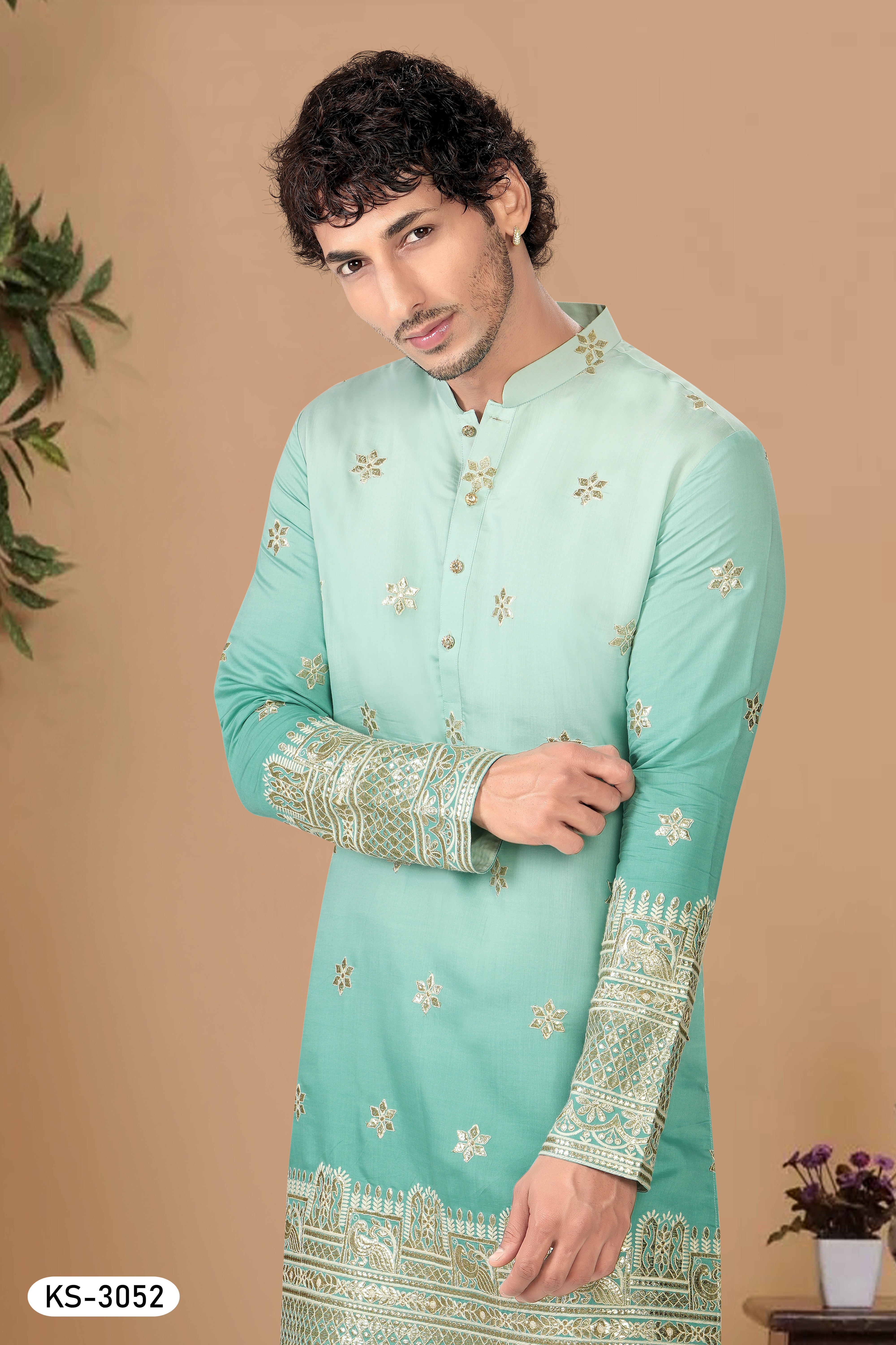 BLUISH-GREEN HUE KURTA SET WITH HEAVY THREAD EMBROIDERY PANEL