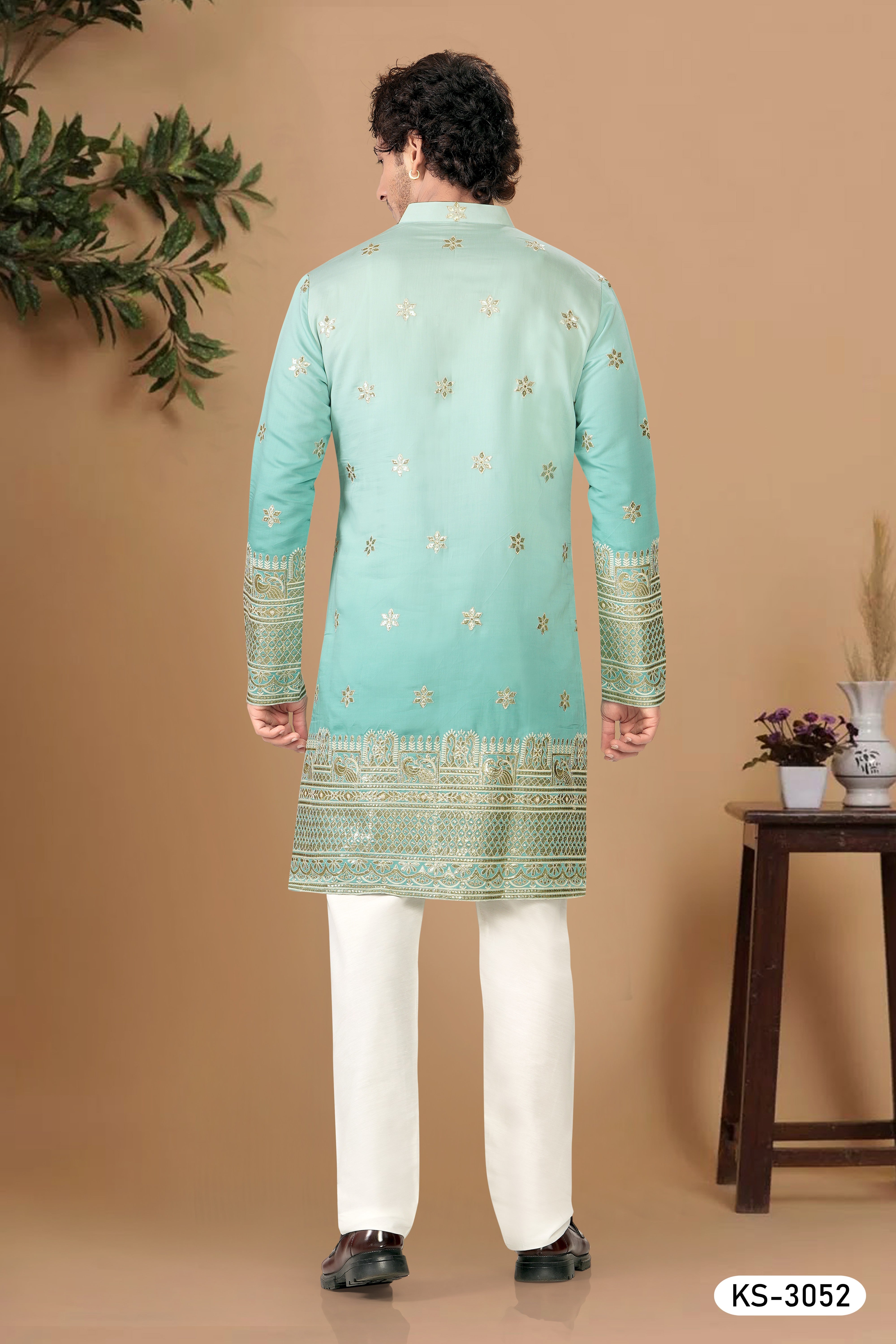 BLUISH-GREEN HUE KURTA SET WITH HEAVY THREAD EMBROIDERY PANEL
