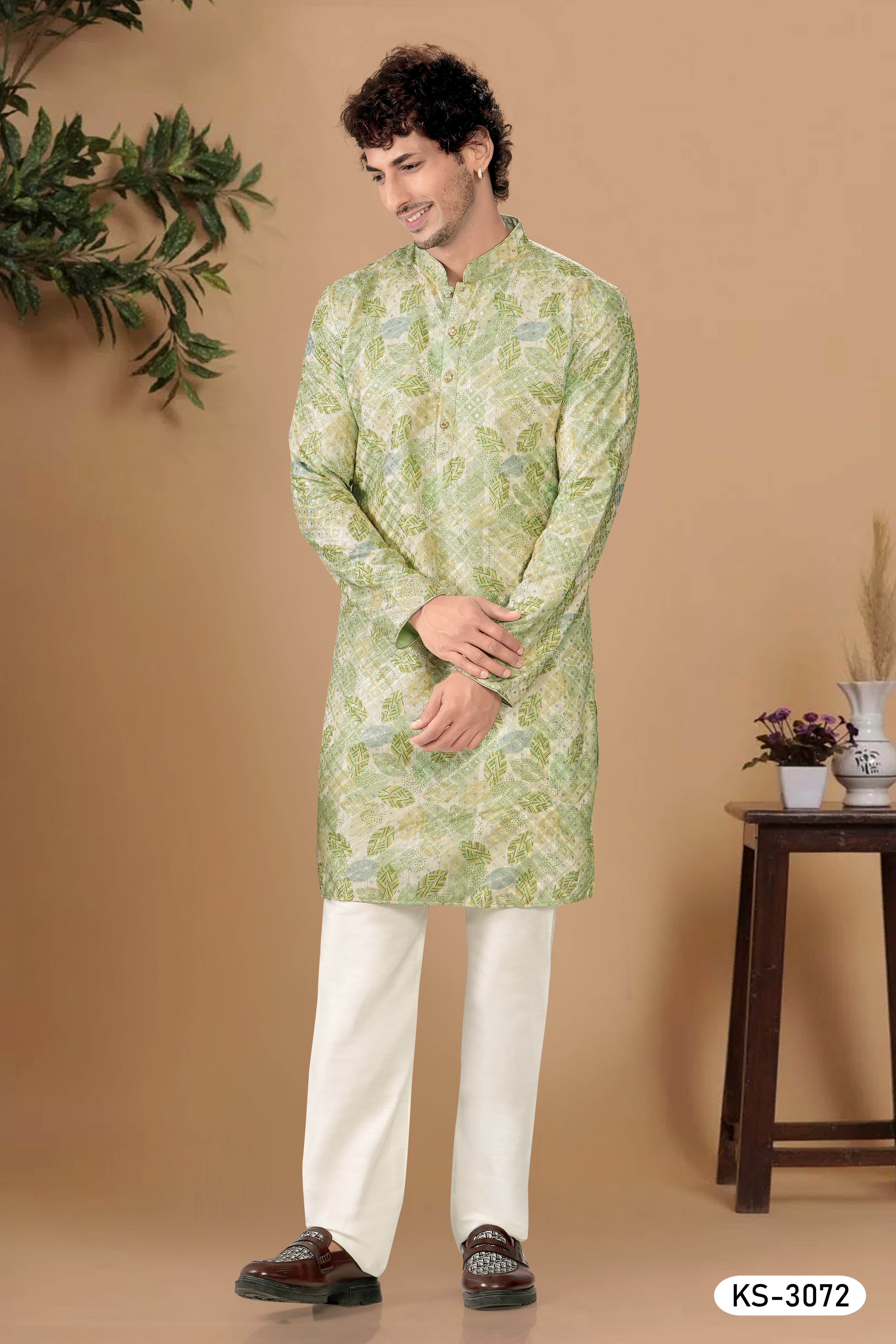 KURTA SET IN GREEN HUE WITH ALL-OVER THREAD EMBROIDERY