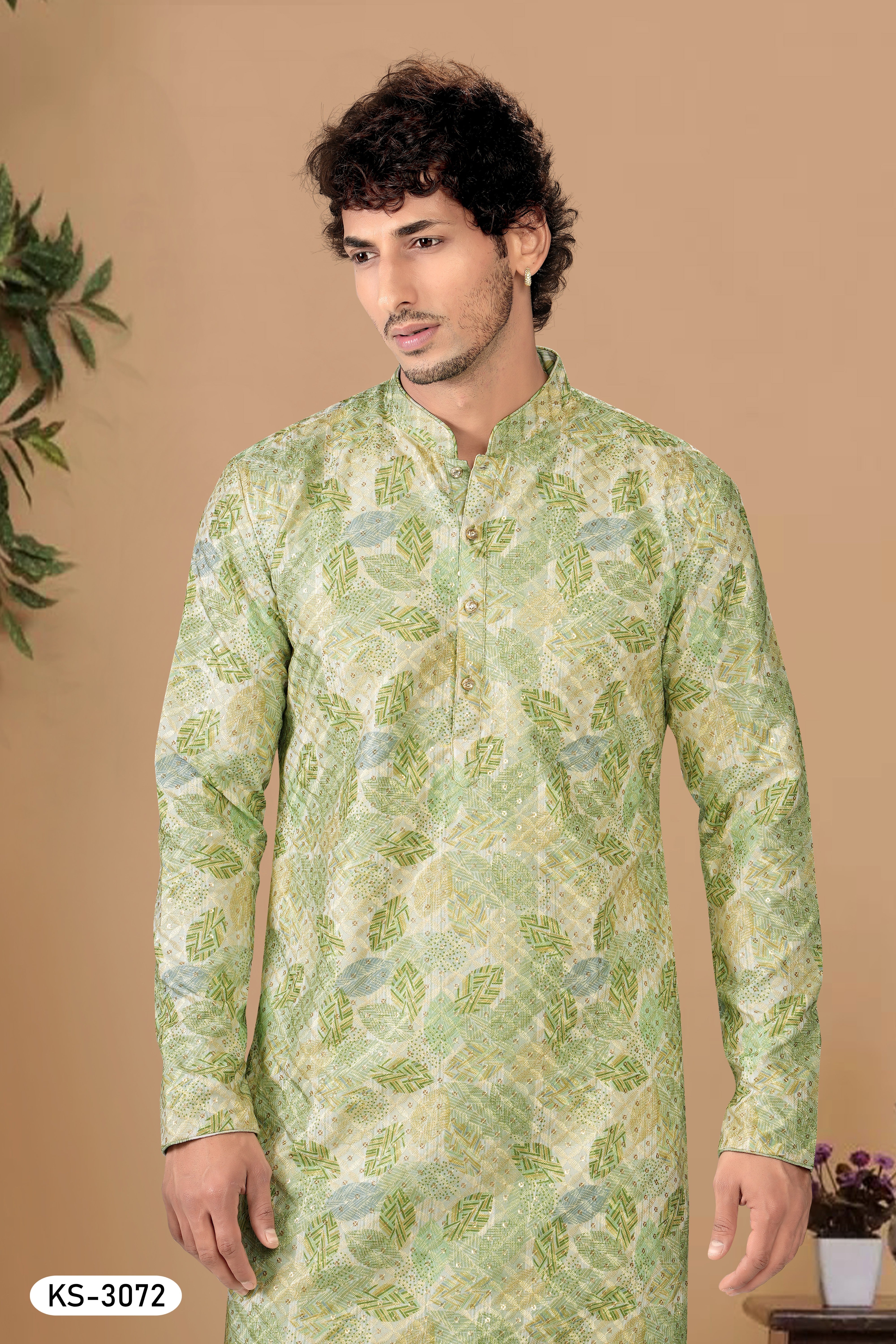 KURTA SET IN GREEN HUE WITH ALL-OVER THREAD EMBROIDERY