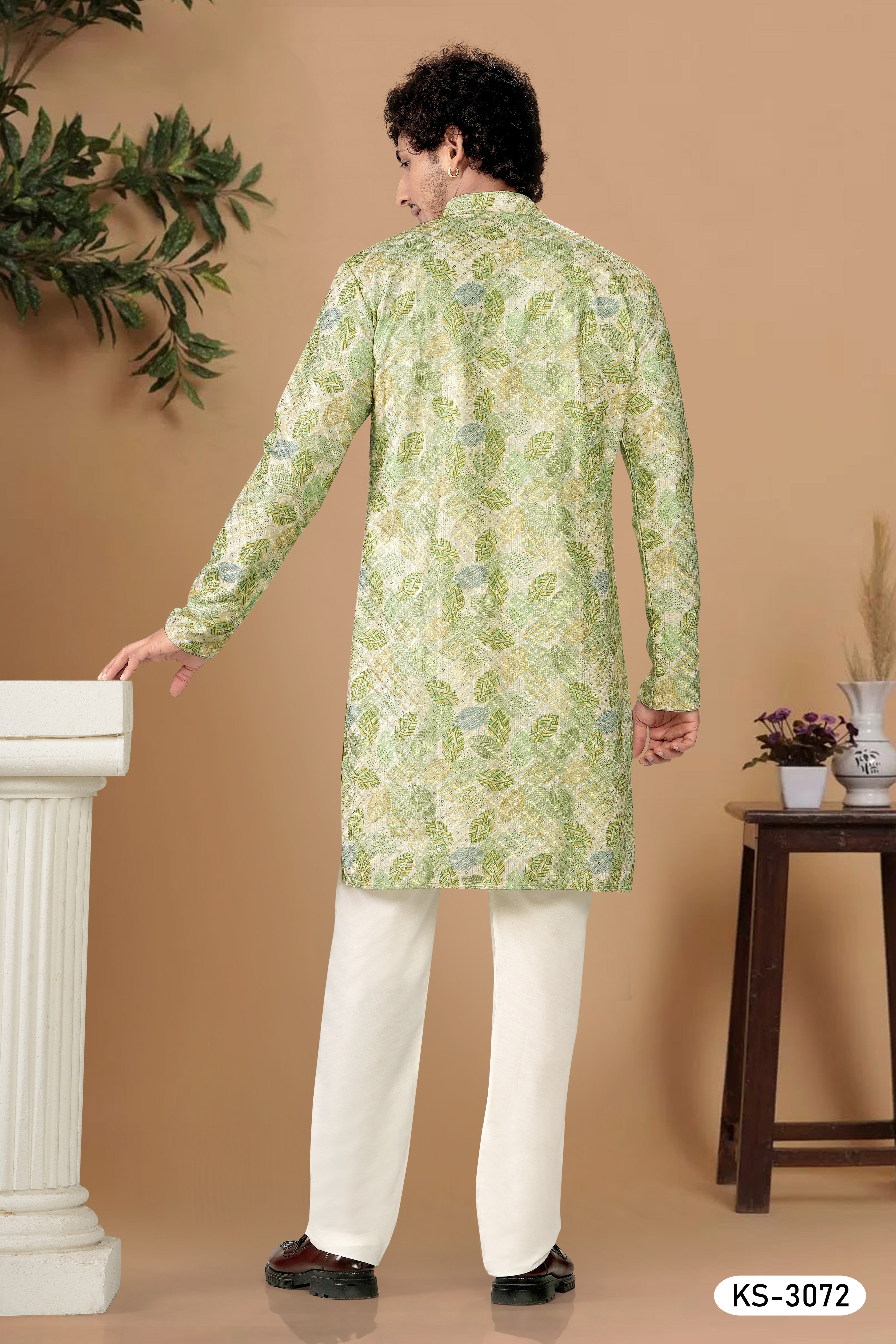 KURTA SET IN GREEN HUE WITH ALL-OVER THREAD EMBROIDERY