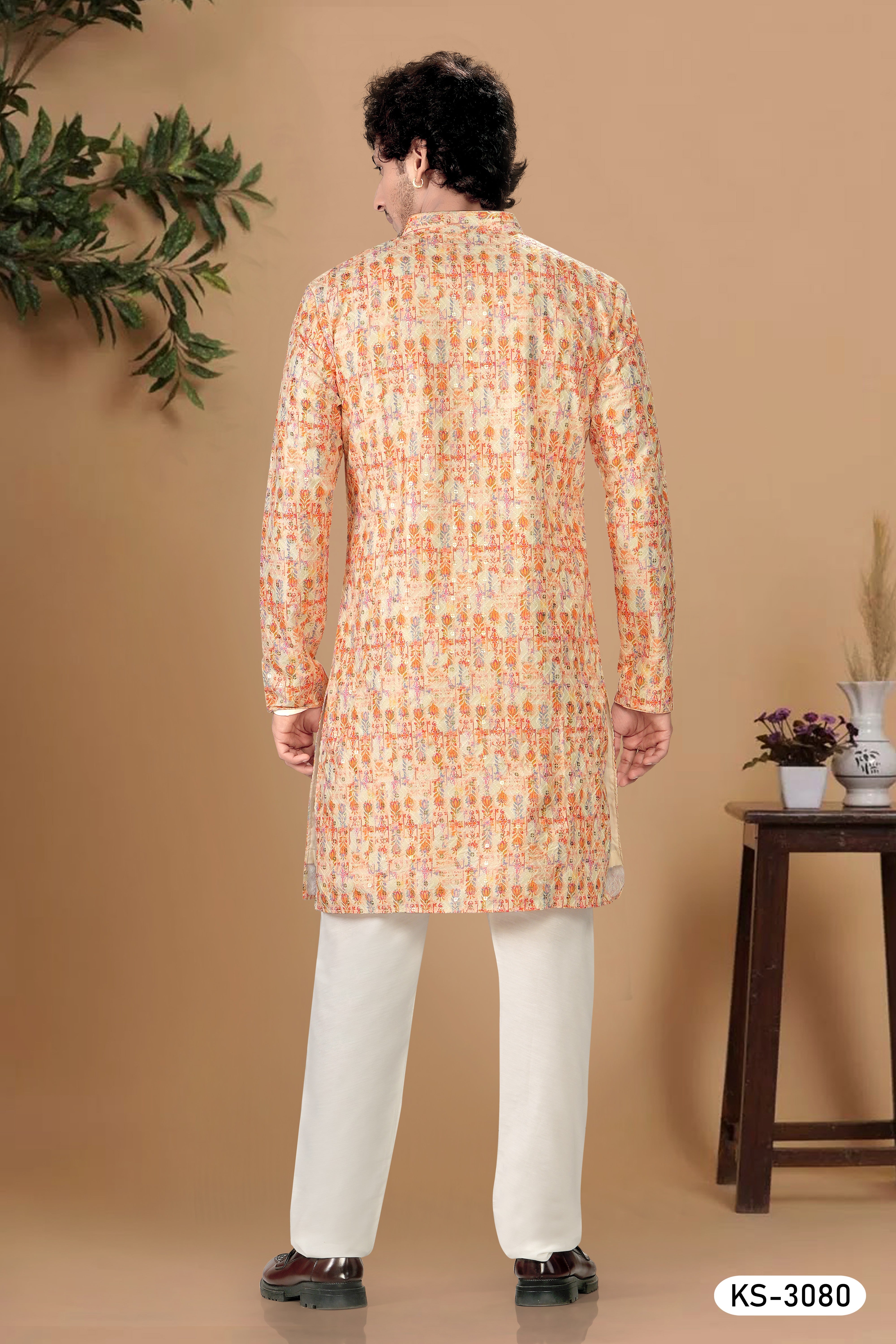 KURTA SET WITH THREAD EMBROIDERY IN ORANGE TONE