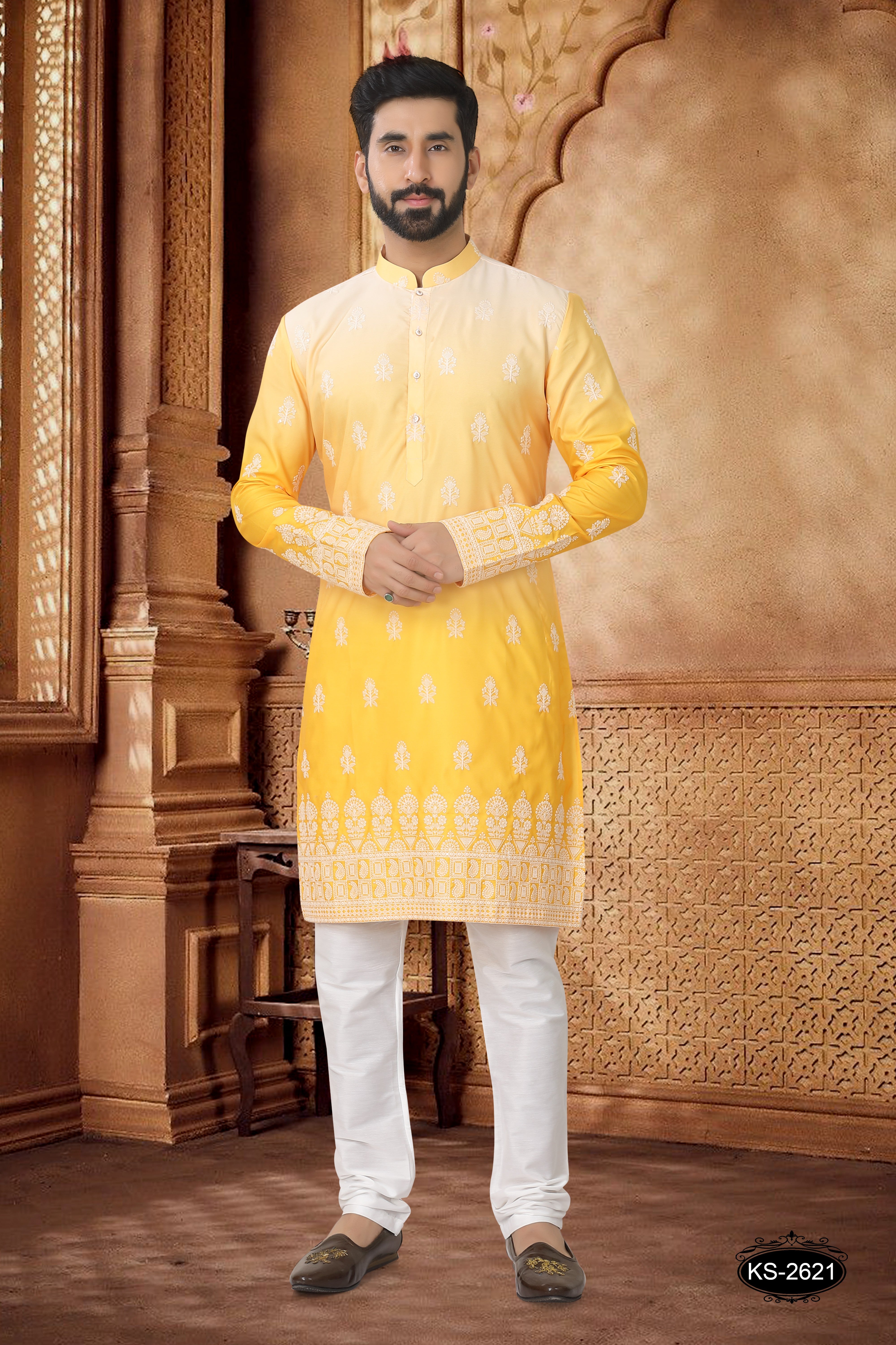 KURTA SET IN YELLOW WITH HEAVY EMBROIDERY PANEL
