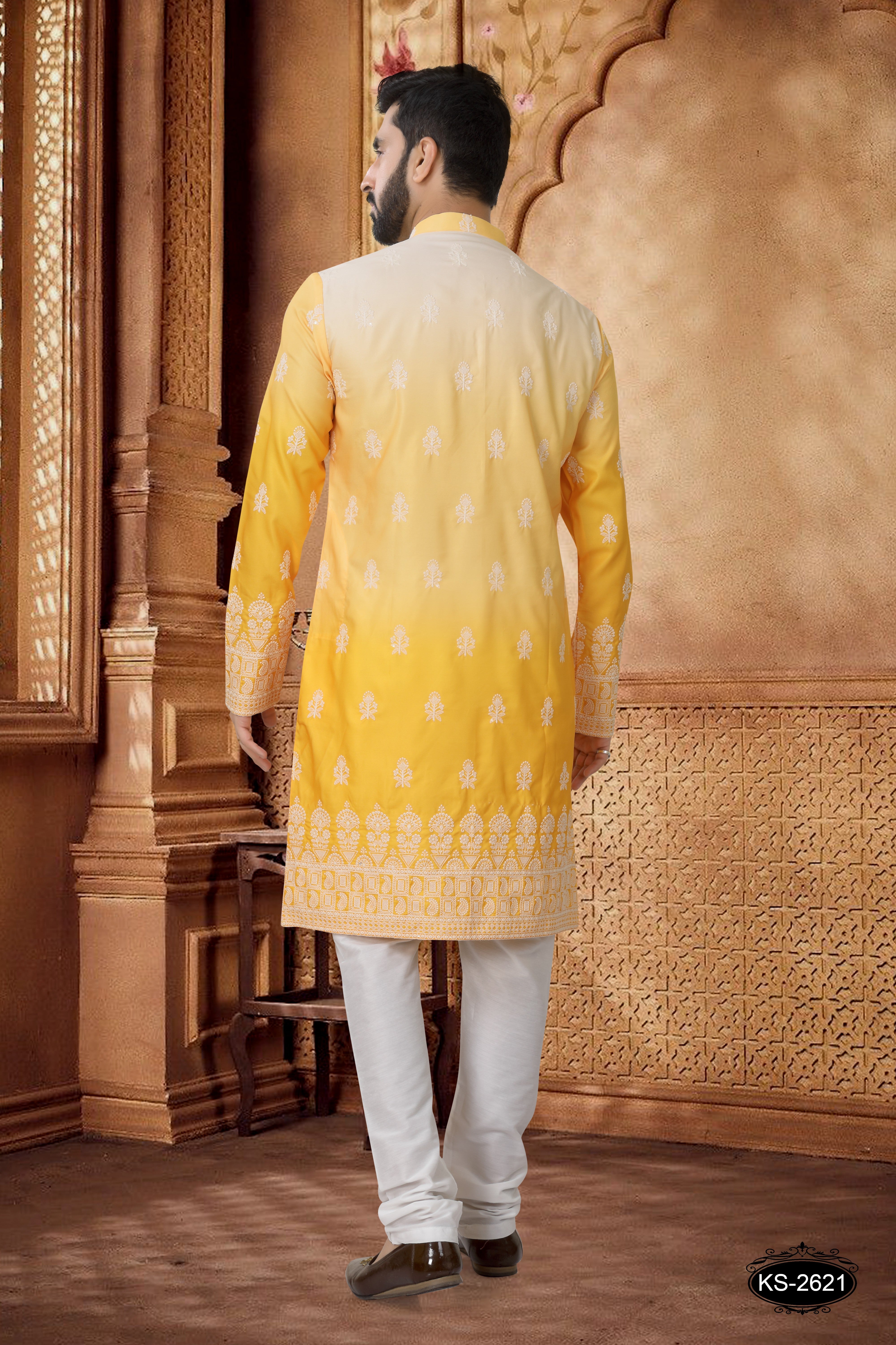 KURTA SET IN YELLOW WITH HEAVY EMBROIDERY PANEL