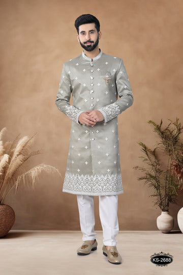 GREEN HUE SHERWANI SET WITH HEAVY PANEL & EMBROIDERY ALL-OVER