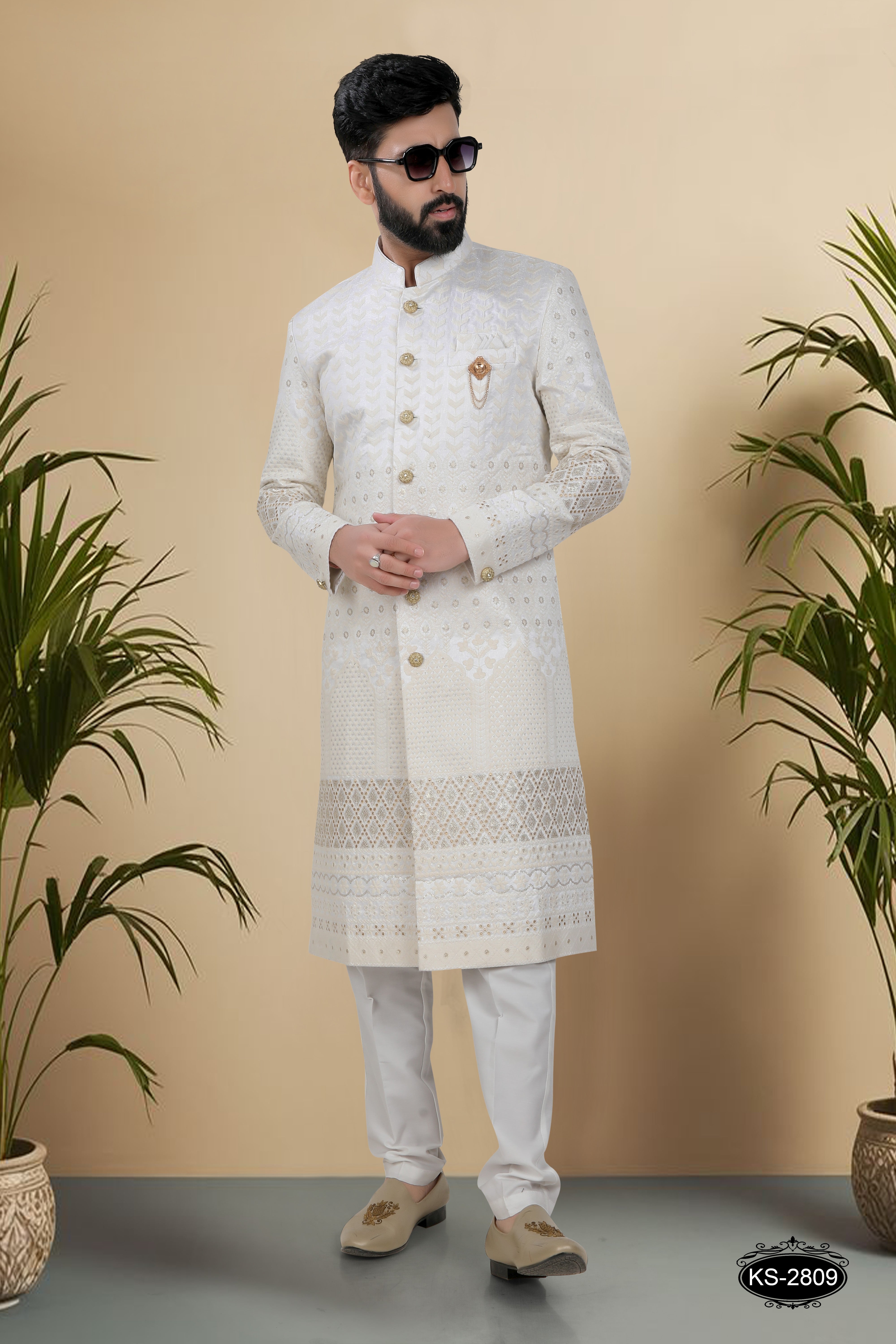 WHITE-BASE SHERWANI SET WITH HEAVY PANEL & THREAD EMBROIDERY ALL-OVER
