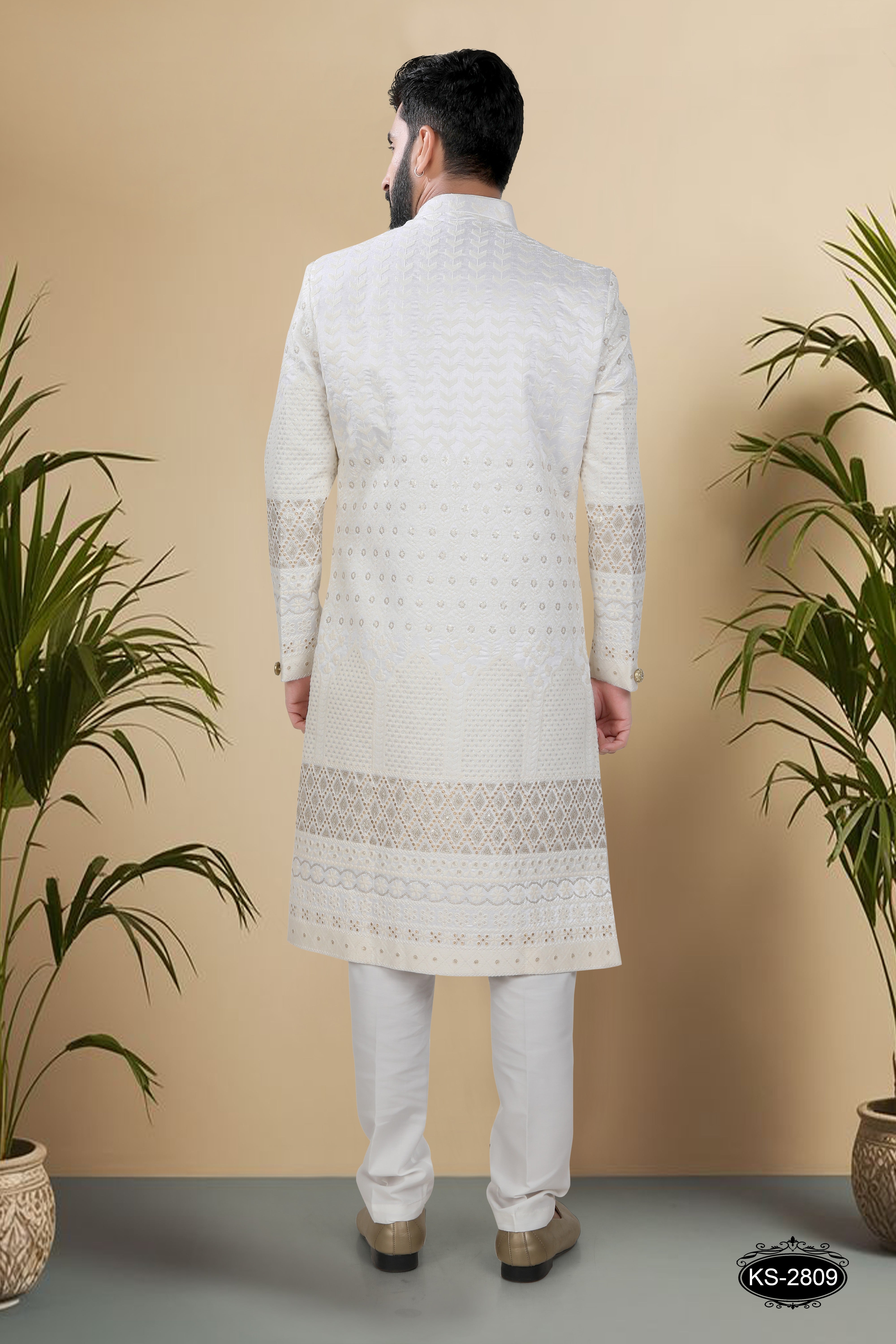 WHITE-BASE SHERWANI SET WITH HEAVY PANEL & THREAD EMBROIDERY ALL-OVER