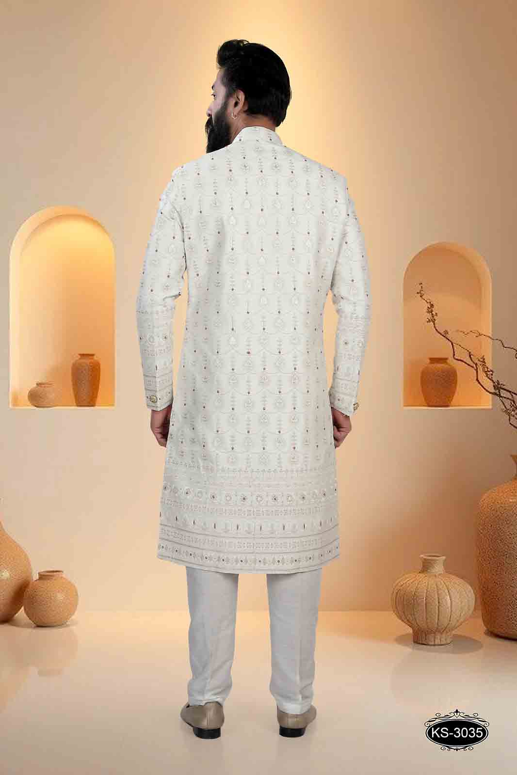 WHITE BASE SHERWANI SET WITH HEAVY EMBROIDERY PANEL FOR EVERY WEDDING OCCASIONS