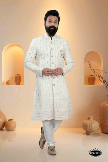 WHITE BASE SHERWANI SET WITH HEAVY EMBROIDERY PANEL FOR EVERY WEDDING OCCASIONS