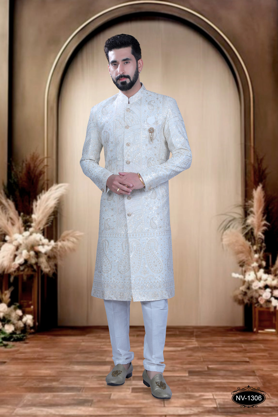 RICH WHITE BASE SHERWANI SET WITH HEAVY THREAD-WORK FOR EVERY TRADITIONAL OCCASIONS